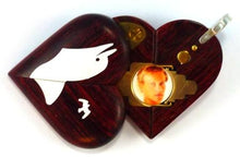 Load image into Gallery viewer, 0026 Thin Sail Boat Illusionist Locket That Transforms Into a Dolphin Locket Rosewood Burgundy