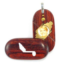 Load image into Gallery viewer, 0009 Thin Rosewood Burgundy Music Note Illusionist Locket That Transforms Into a Dove Locket