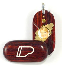 Load image into Gallery viewer, 0008 Thin Piano Illusionist Locket That Transforms Into a Music Note Locket Rosewood Burgundy