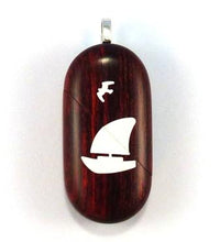 Load image into Gallery viewer, 0026 Thin Sail Boat Illusionist Locket That Transforms Into a Dolphin Locket Rosewood Burgundy
