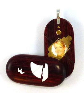 0026 Thin Sail Boat Illusionist Locket That Transforms Into a Dolphin Locket Rosewood Burgundy